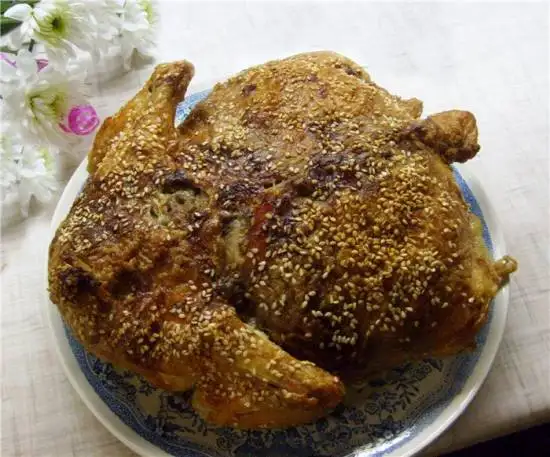 Курица, фаршированная потрошками