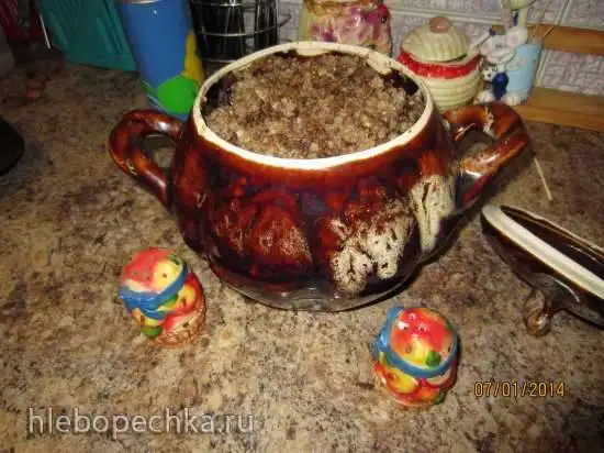 Утка, фаршированная гречкой, черносливом и куриной печенью, запеченная в рукаве