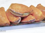 571080